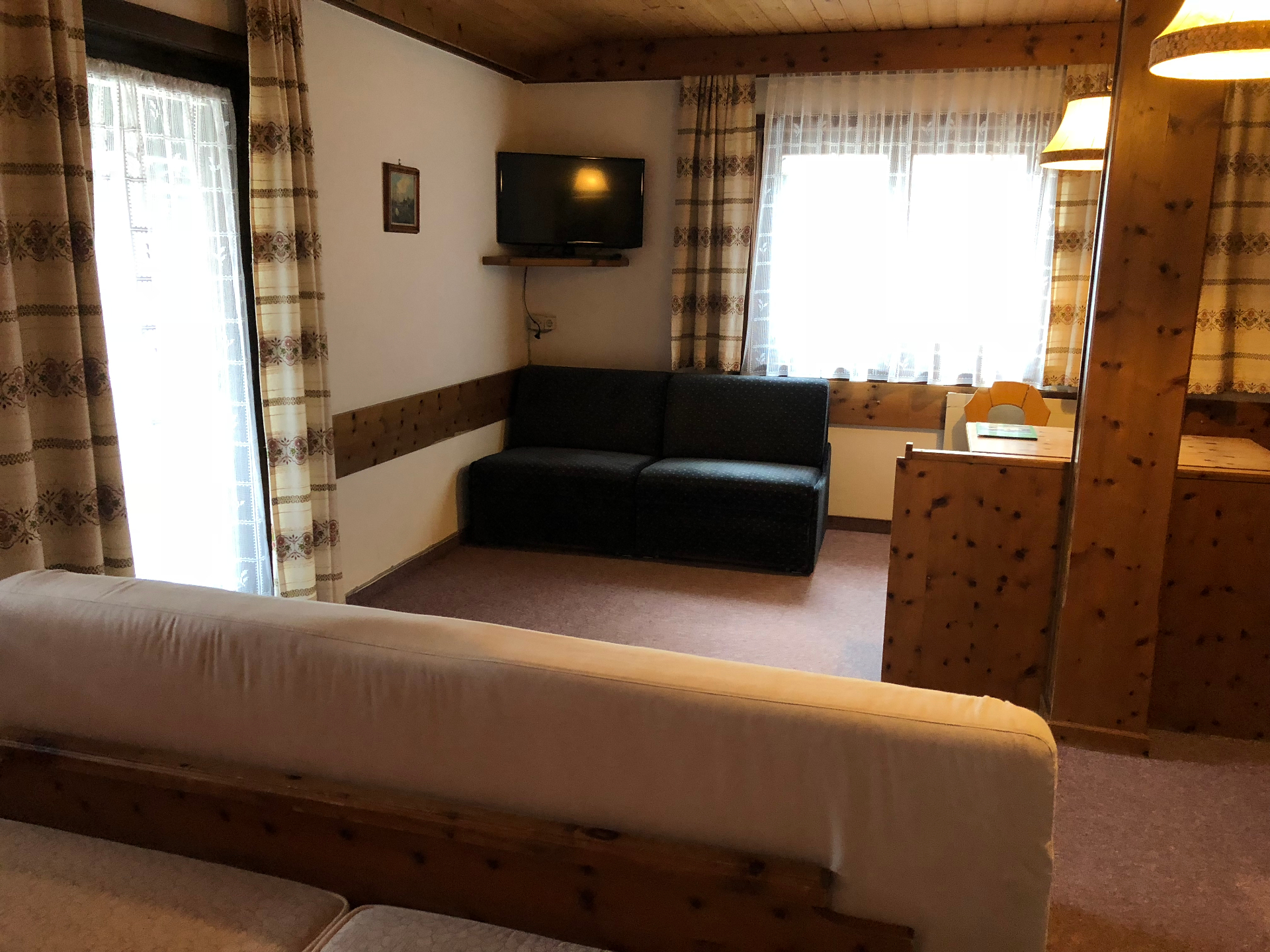 Familieværelse Bernkogel - Siddeområde med sovesofa
